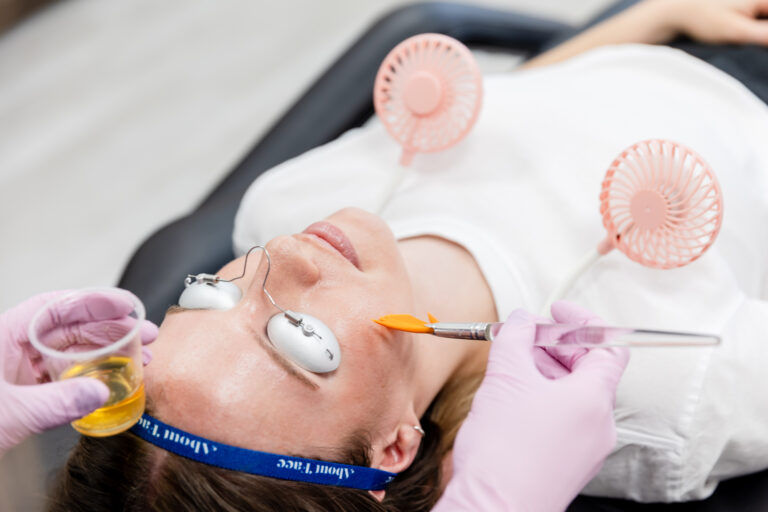 A woman gets a chemical peel at About Face Aesthetics